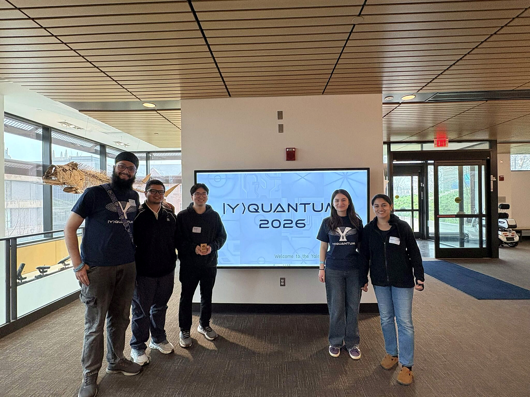 The Popeyes team standing beside a YQuantum 2026 display at Yale University